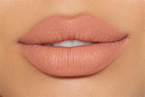 cool toned peach lipstick.